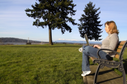 woman-on-park-bench-using-laptop-with-wifi.jpg